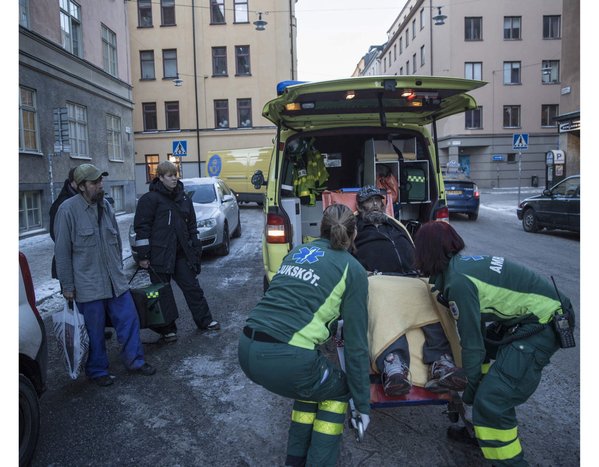 Matte calls an ambulance for Pekka to get him to the hospital. Pekka is so tired and sick that he can barely stand up.